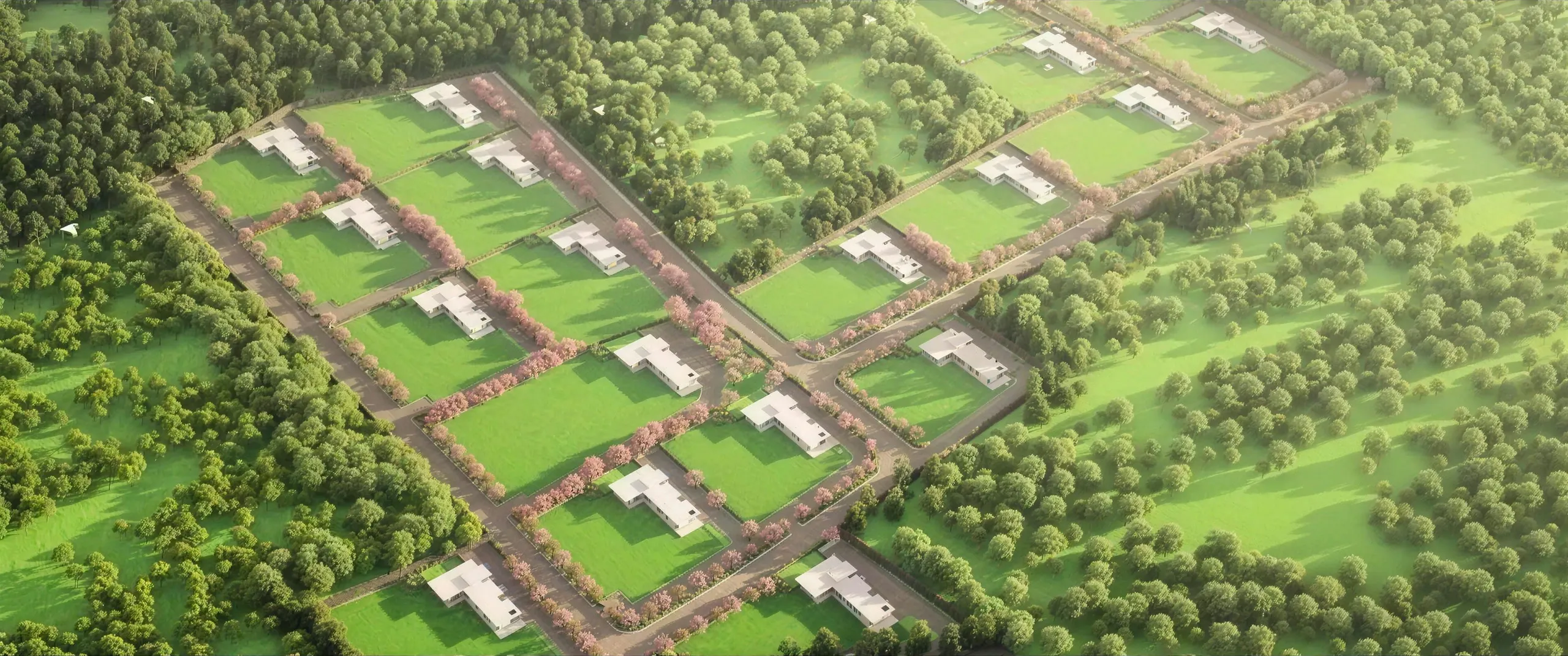 Master plan of Tranquil Farms seen from the air: nineteen plots in angled bands along tree-lined internal roads, with open orchard beyond